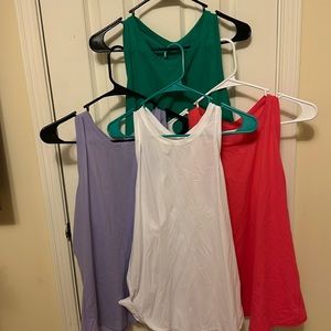 4 like New Lululemon Nulux slim fit tank tops size 12